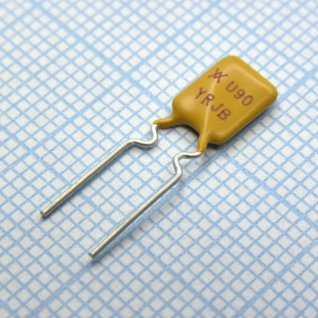 Самовосстанавливающийся предохранитель PTC 0.9A(hold) 1.8A(trip) 30V 100A 0.6W 5.9s 0.07Ohm Radial 7.4 X 3 X 12.2mm Bag